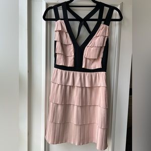 BCBG tiered mini dress with v neck and criss cross back details